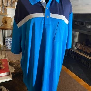 Pro Tour polo shirt. Size XXL colors are aqua, blue and white.